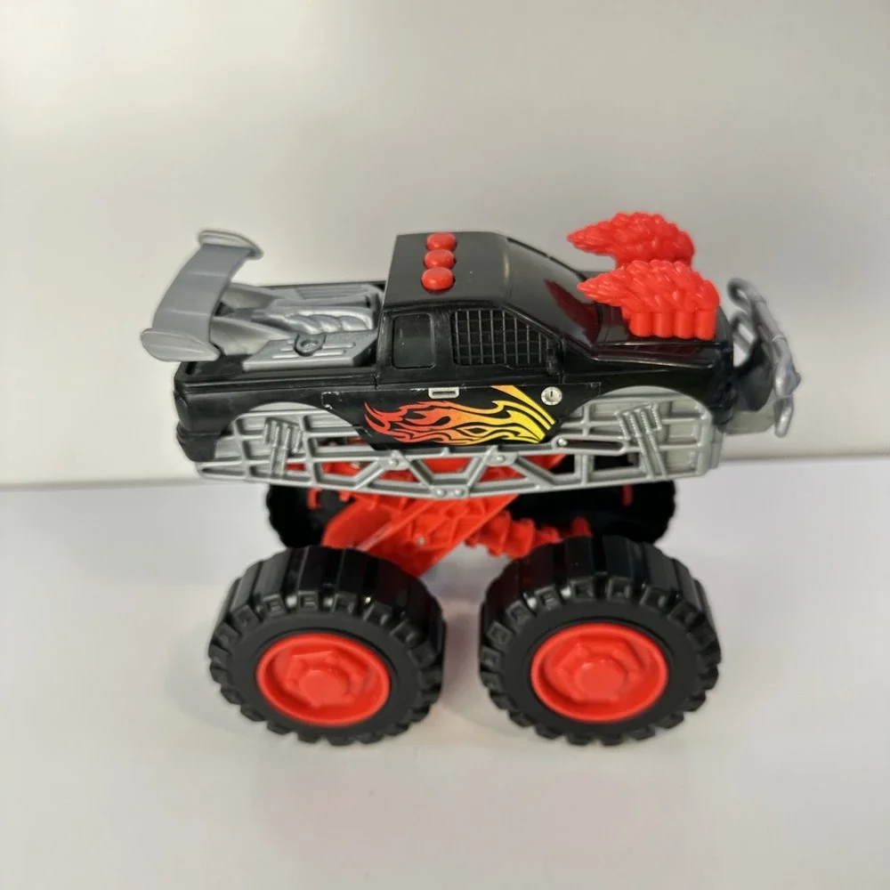 Monster Truck Lot of 4 Vehicles Light Up Body Action Fun Group 6-9 Inches Long
